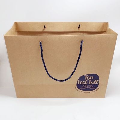 Bom preço Sacos de papel impressos costume reciclados do presente dos sacos de papel de Kraft com corda de nylon on-line